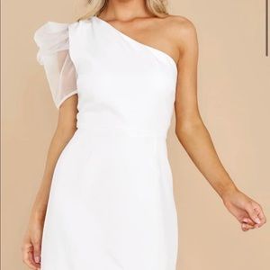 Brand new. Never worn. White one shoulder puff dress